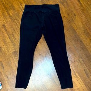 a new day black leggings, high-waisted, faux front pockets, two back pockets.